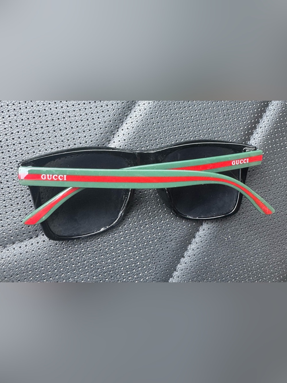 Black Sunglasses with Green and Red Stripe Detail and logo